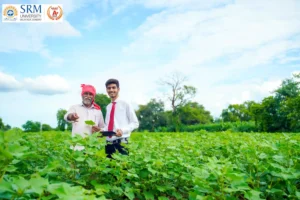 indian-farmer-with-agronomist-cotton-field-showing-some-information-tab.webp